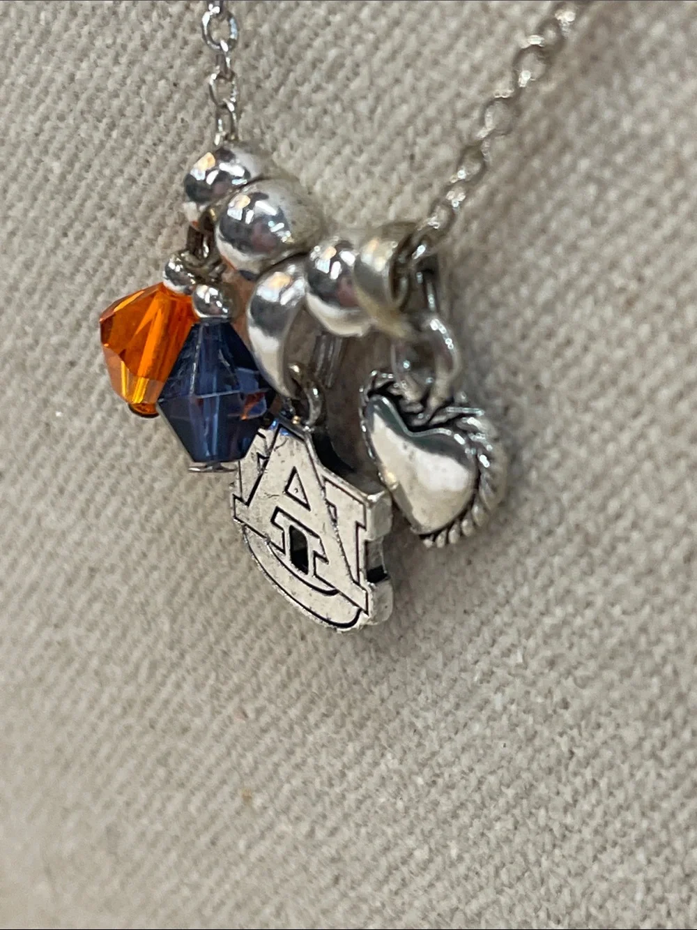 Auburn collegiate silver necklace with AU pendant in blue and orange